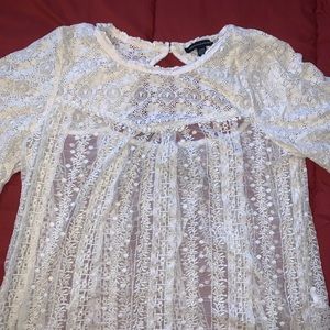 white blouse with designs